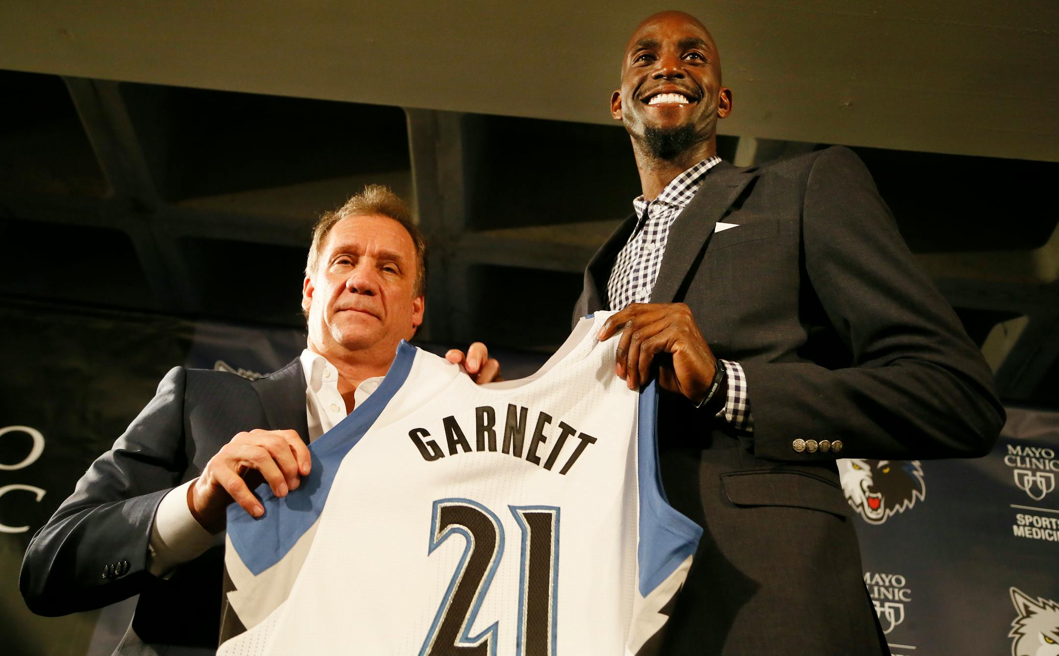 Timberwolves coach Flip Saunders left and Kevin Garnett posed for a photo after he was introduced to the Twins Cities media at Target Center Tuesday February 24, 2015 in Minneapolis, MN.