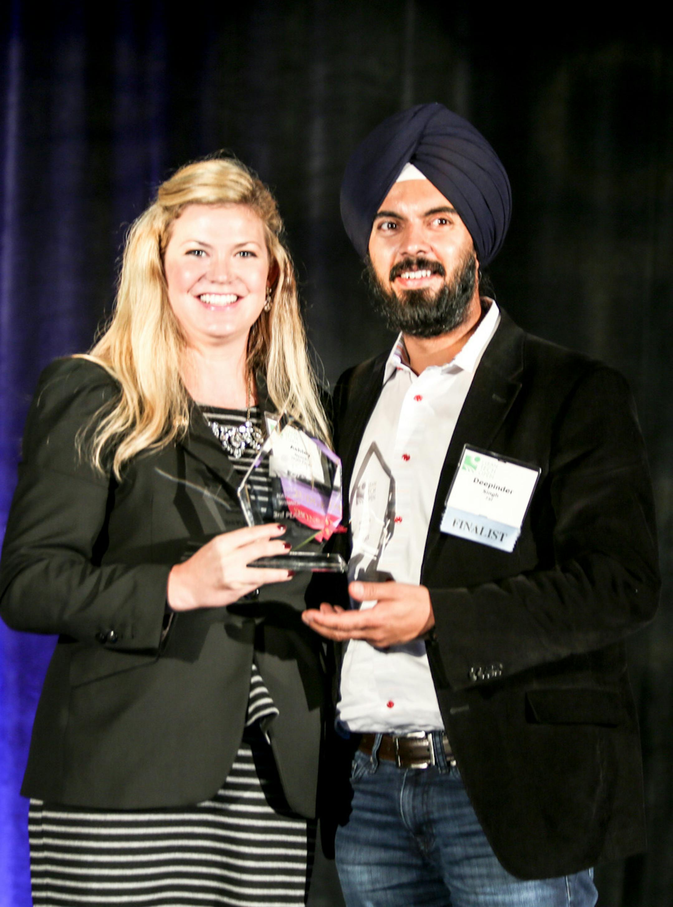 Ashley Grosh, Wells Fargo environmental affairs project manager with CEO Deepinder Singh of Mankato-based 75F, a national award winner at the Cleantech Global Open Forum in San Francisco earlier this month.
