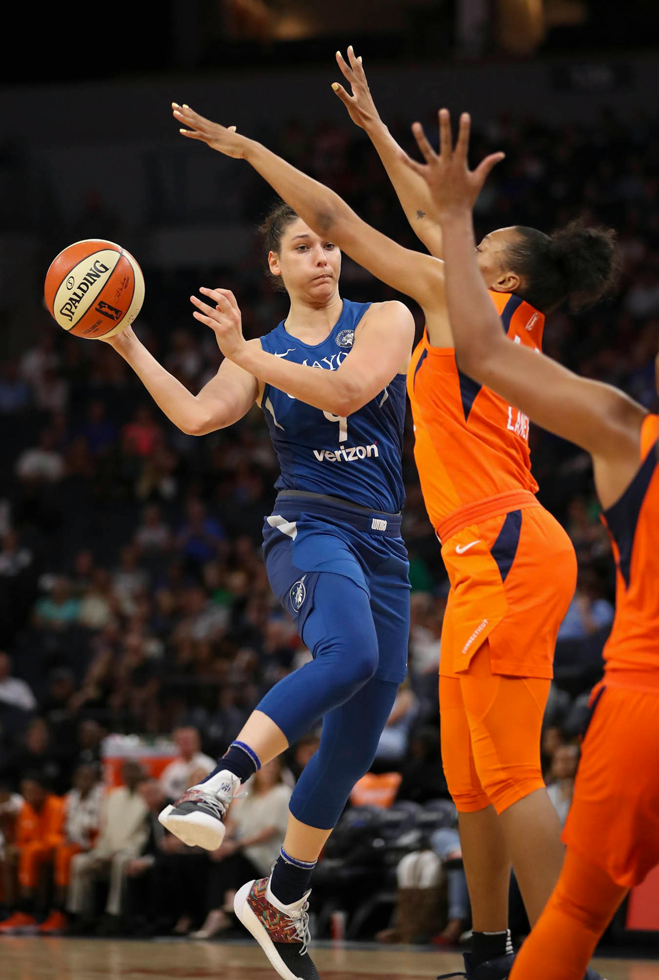 Minnesota Lynx forward Cecilia Zandalasini (9) passed off in the fourth quarter while defended by Connecticut Sun forward Betnijah Laney (44). ] JEFF WHEELER ï jeff.wheeler@startribune.com The Minnesota Lynx were burned by the Connecticut Sun 83-64 in an WNBA game Sunday night, July 15, 2018 at Target Center in Minneapolis.