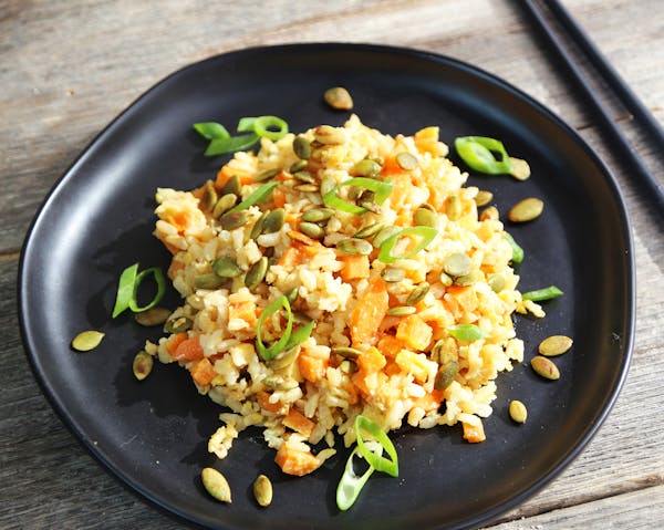 Root Vegetable Fried Rice With Pumpkin Seeds.