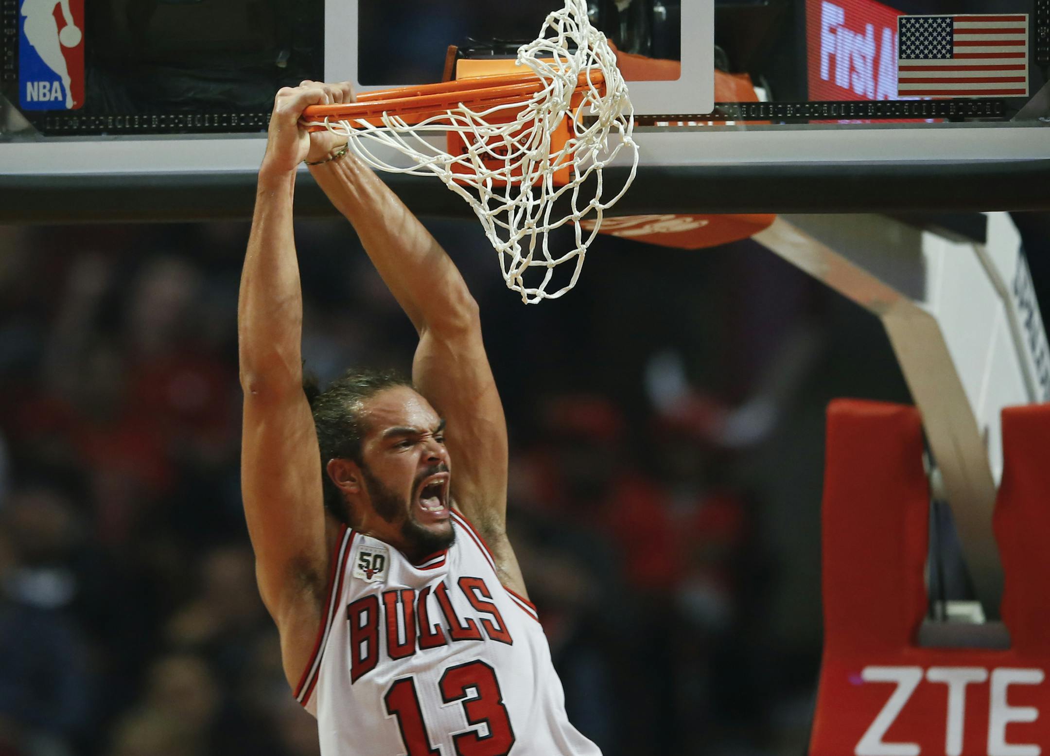 Chicago Bulls center Joakim Noah, reacts after scoring against the Orlando Magic, during the first half of an NBA basketball game, Sunday, Nov. 1, 2015, in Chicago. (AP Photo/Kamil Krzaczynski) ORG XMIT: CXA139