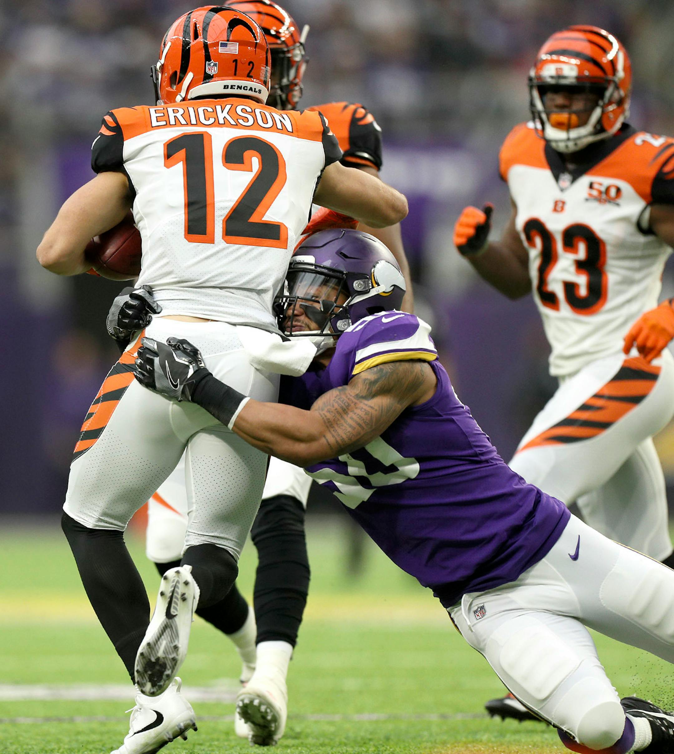Vikings linebacker Eric Wilson (50) tackled Cincinnati Bengals wide receiver Alex Erickson (12) for no gain during the first quarter Sunday.