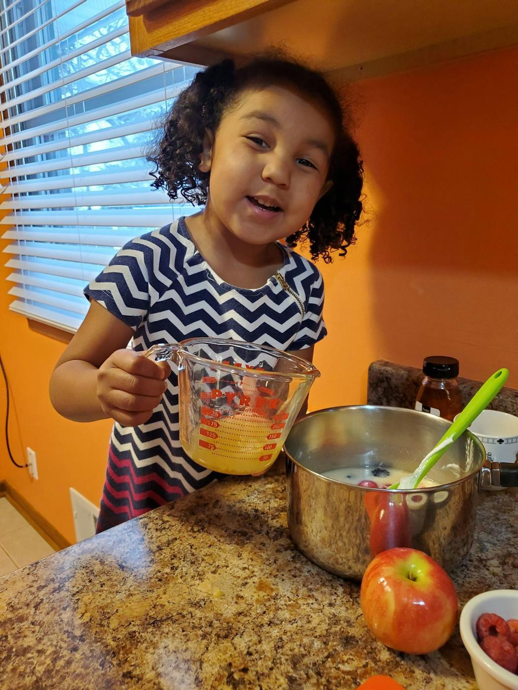 Everly, 3, from Brooklyn Center, makes Pretend Soup.