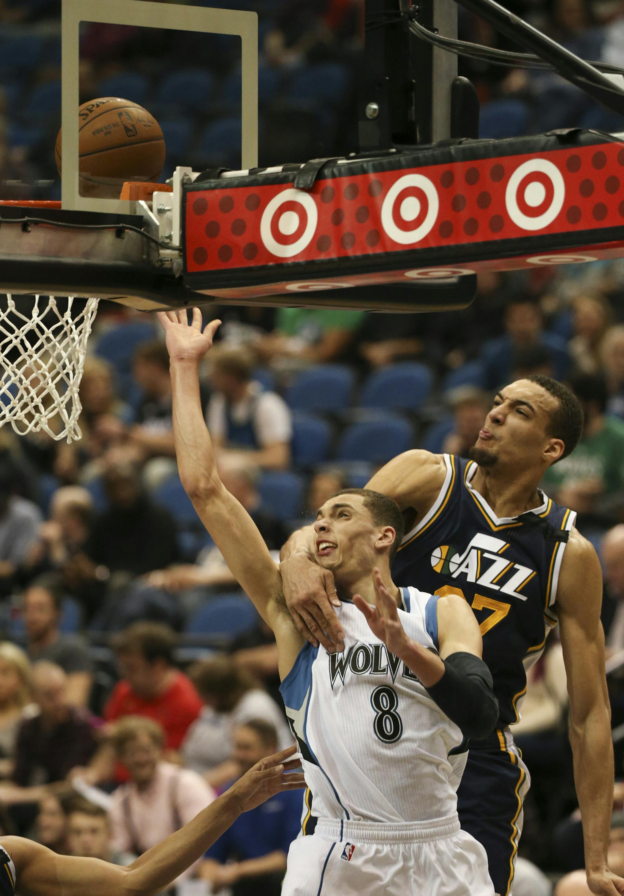 Timberwolves guard Zach LaVine was fouled by Utah Jazz center Rudy Gobert as he took a shot in the fourth quarter Monday night at Target Center. LaVine led the Wolves with 21 points. ] JEFF WHEELER &#xef; jeff.wheeler@startribune.com The Minnesota Timberwolves lost to the Utah Jazz 104-84 Monday night, March 30, 2015 at Target Center in Minneapolis.