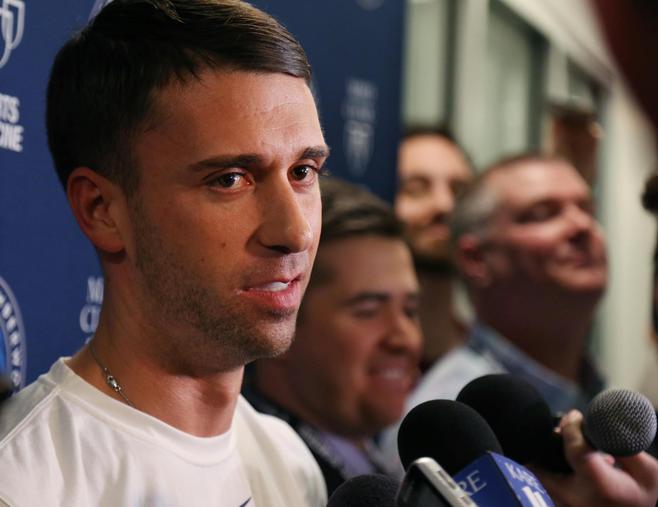 Interim coach Ryan Saunders cited communication with the Wolves' young core players as a strength Monday, his first day at the Timberwolves' helm.