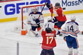 Florida Panthers center Evan Rodrigues (17) celebrates after scoring during the third period of Game 2 of the NHL hockey Stanley Cup Finals against th