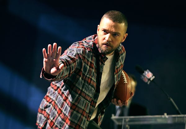 Justin Timberlake struck a Heisman pose after a press conference at the Hilton Hotel about his performance at the Super Bowl half time show Feb 1, 201