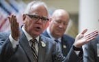 Governor Tim Walz left, Commissioner Larry Herke , and Patrick Kelly, director of the Minneapolis VA spoke during a news conference at the Minneapolis