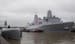 The USS New York is seen docked on a pier adjacent to West 47th Street in the Hudson river in New York on Thursday, Sept. 8, 2011. Portions of the hul