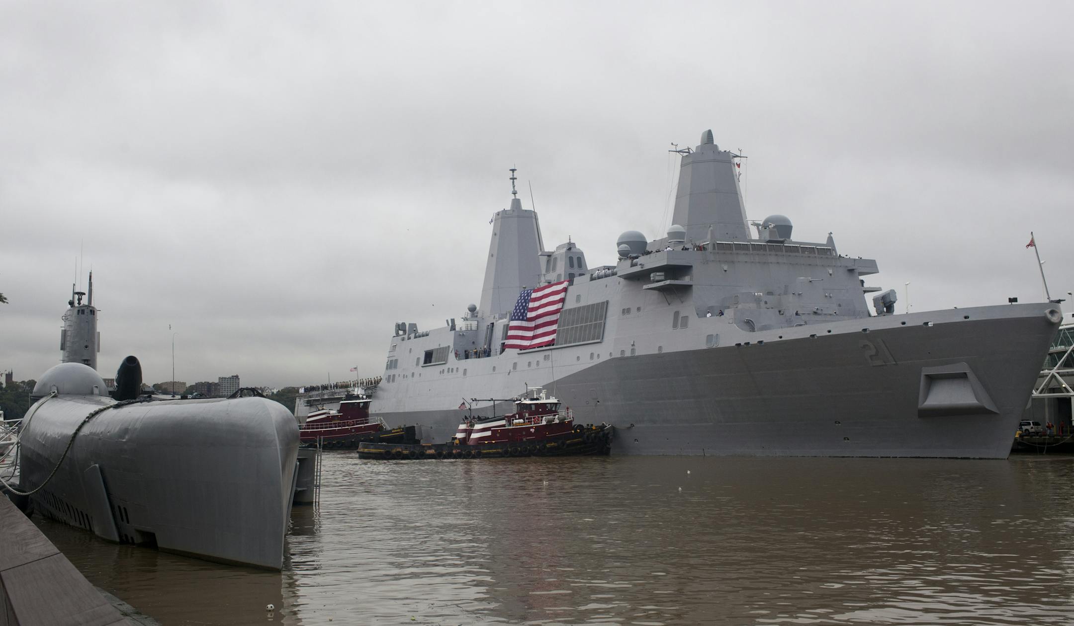 The USS New York is seen docked on a pier adjacent to West 47th Street in the Hudson river in New York on Thursday, Sept. 8, 2011. Portions of the hull of the USS New York were made out of iron salvaged from the wreckage of ground zero. AP Photo/Andrew Burton