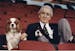 Norm Green, former owner of the North Stars, shown in a 1991 photo with his dogs, Charles and Rupert.