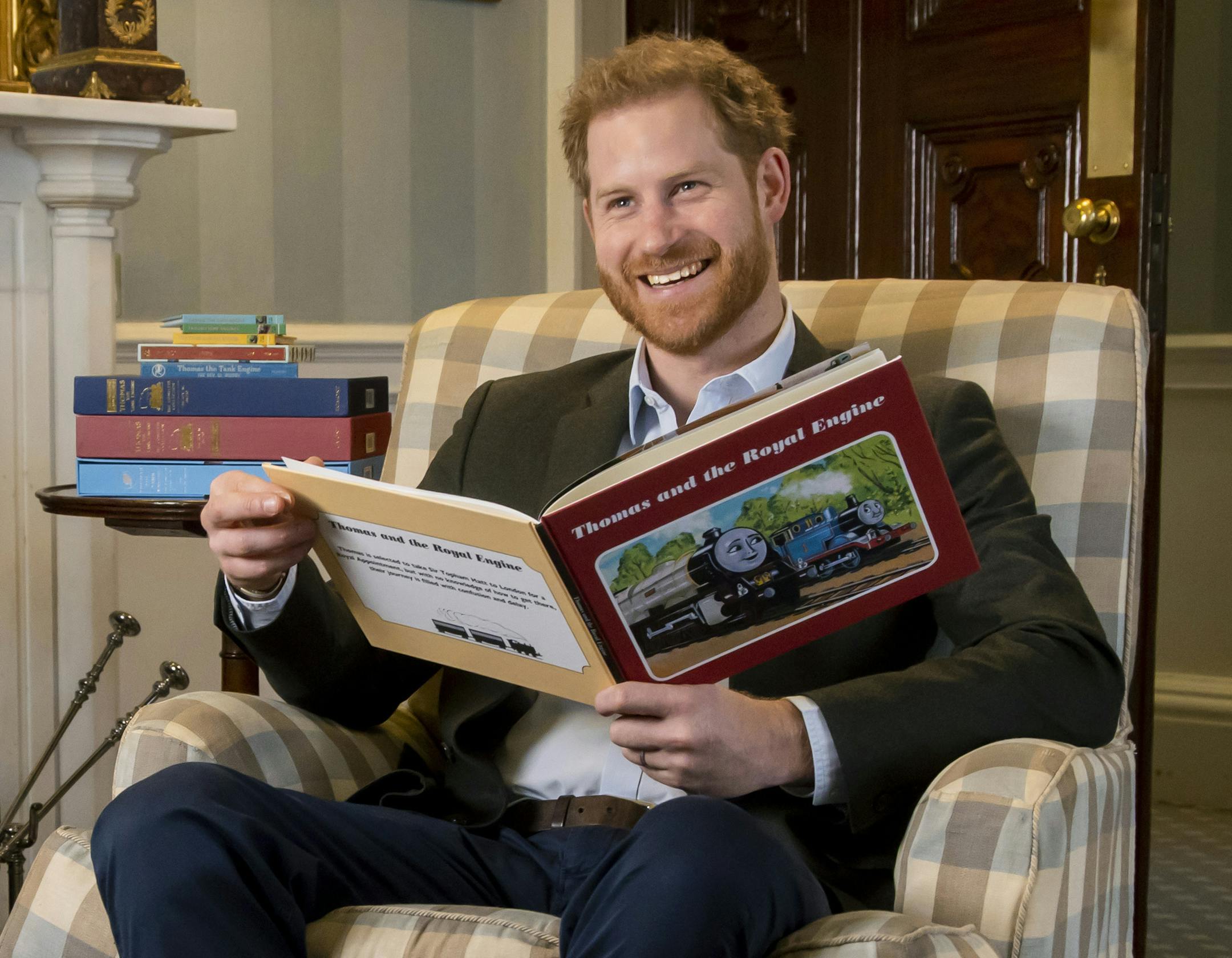 In this January, 2020 photo and made available on Monday April 27, 2020 by Mattel, Britain's Prince Harry poses for a photo during the recording of his introduction to the new animated special 'Thomas & Friends: The Royal Engine'. Set when the the Prince Harry's father, Prince Charles was a boy, Thomas has to take Sir Topham Hatt, the controller of the railway, to Buckingham Palace to receive an honour. The special will be screened in the US on Netflix on 1 May, 2020 and in the UK on Channel 5 M
