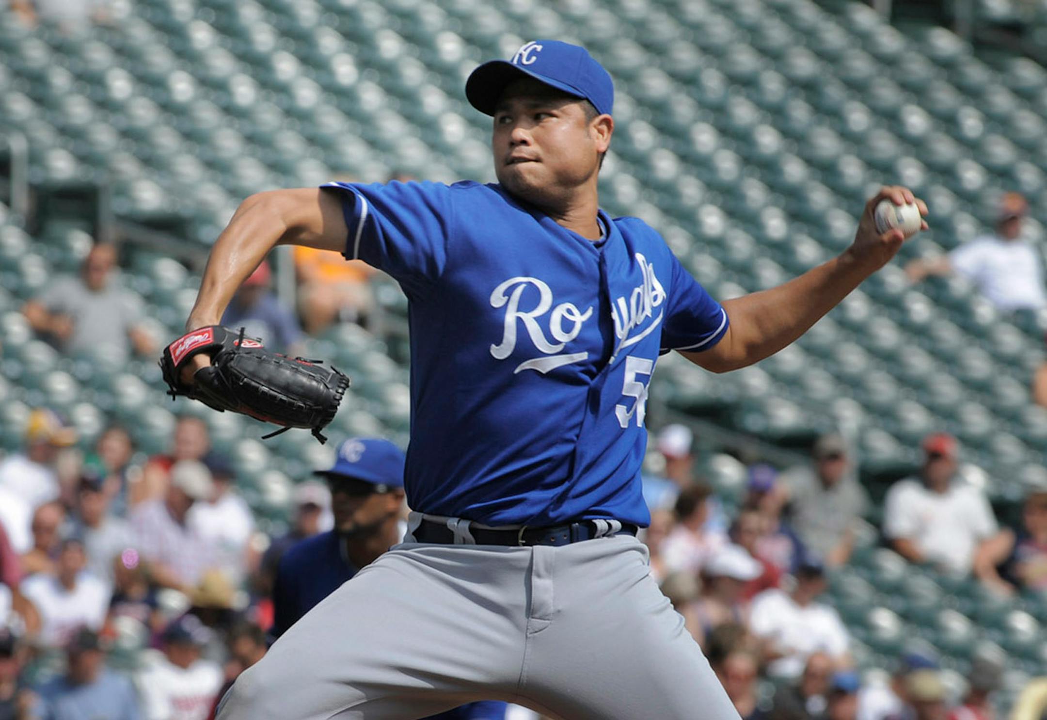 Kansas City Royals' Bruce Chen pitches against the Minnesota Twins during the first inning of a baseball game, Thursday, Aug. 29, 2013, in Minneapolis. (AP Photo/Tom Olmscheid)
