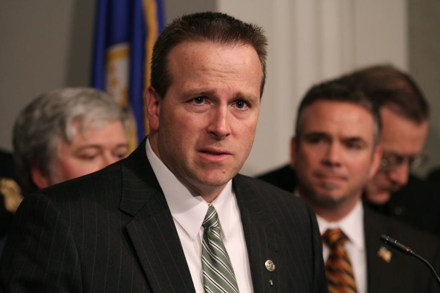 (center) Representative Bob Barret held a press conference on his and Public Safety Chairman Tony Cornish's legislation (House File 2508) that addresses the problem of synthetic drug production and use in Minnesota. Barrett, law enforcement officials and others testified on 3/1/12 to the Public Safety committee hearing.