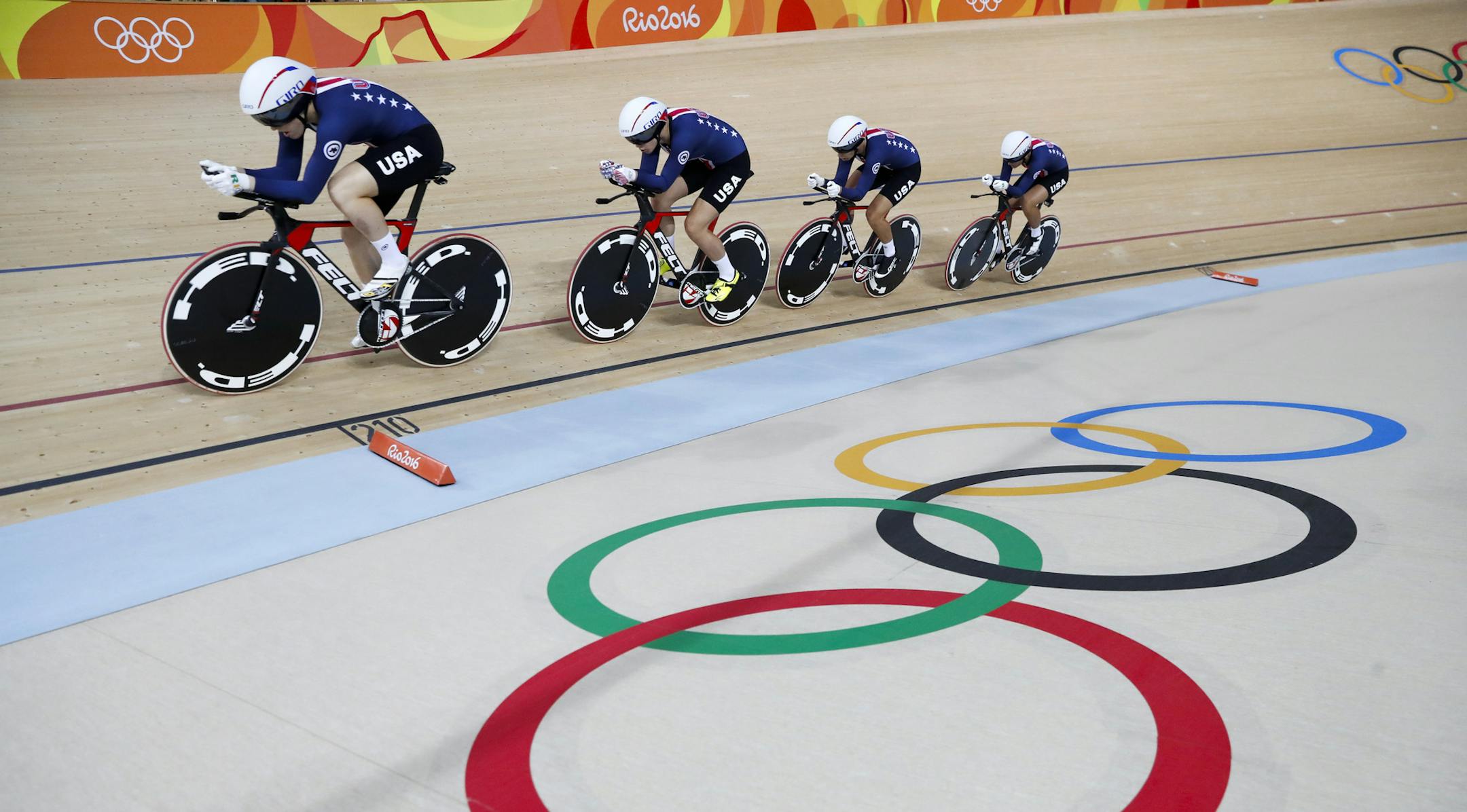 United States' team compete in the women's team pursuit qualifying at the Rio Olympic Velodrome during the 2016 Summer Olympics in Rio de Janeiro, Brazil, Thursday, Aug. 11, 2016. (AP Photo/Patrick Semansky) ORG XMIT: OCYC124