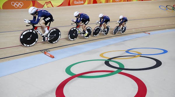 United States' team compete in the women's team pursuit qualifying at the Rio Olympic Velodrome during the 2016 Summer Olympics in Rio de Janeiro, Bra