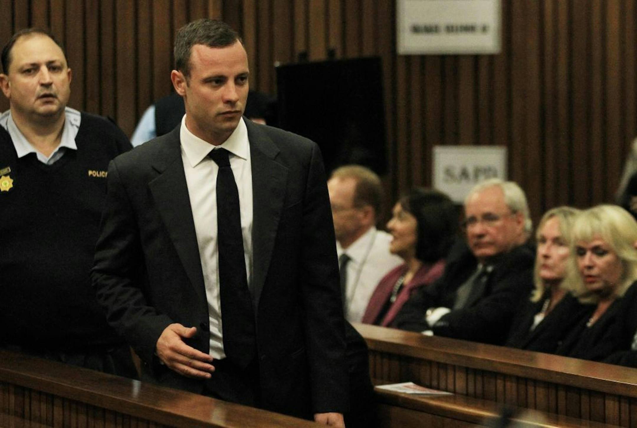 Oscar Pistorius arrives for his trial at the high court in Pretoria, South Africa, Monday, March 3, 2014.