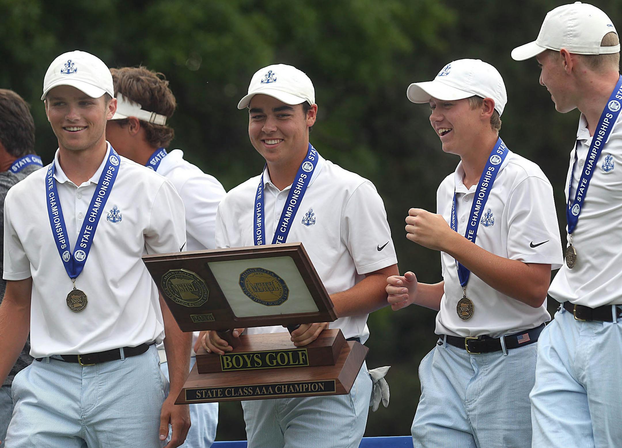Minnetonka won the team championship, and Ben Sigel (holding trophy) was the winner of this yearís 3A tournament.] JIM GEHRZïjames.gehrz@startribune.com (JIM GEHRZ/STAR TRIBUNE) / June 15, 2016/ 11:00 AM , Coon Rapids, MN - BACKGROUND INFORMATION: Class 3A championship, boys and girls. Class 3A boys and girls' golf, final round. Game action, celly. team and individual winners in both genders.