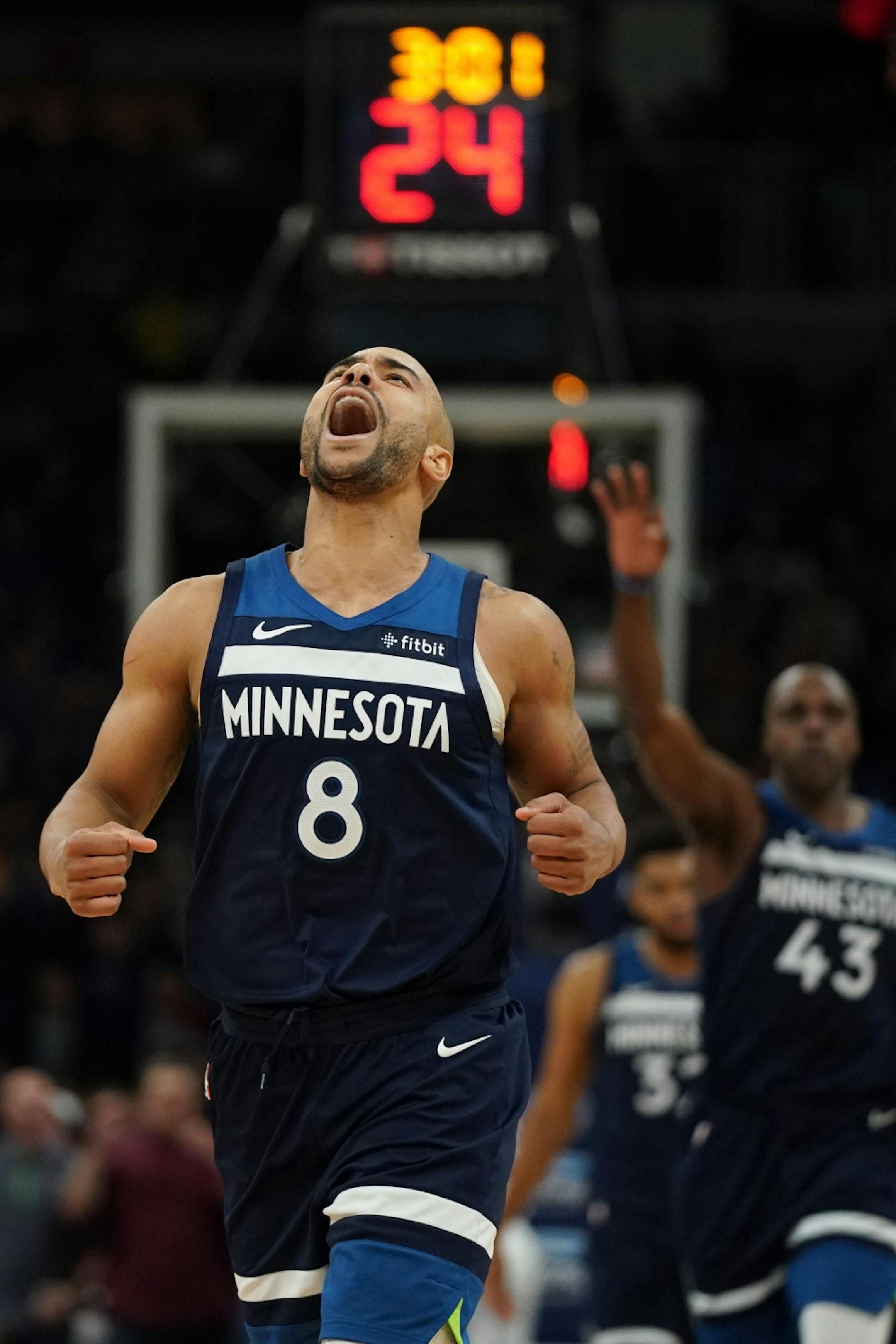 Minnesota Timberwolves guard Jerryd Bayless (8) celebrated after hitting a three point shot in overtime.
