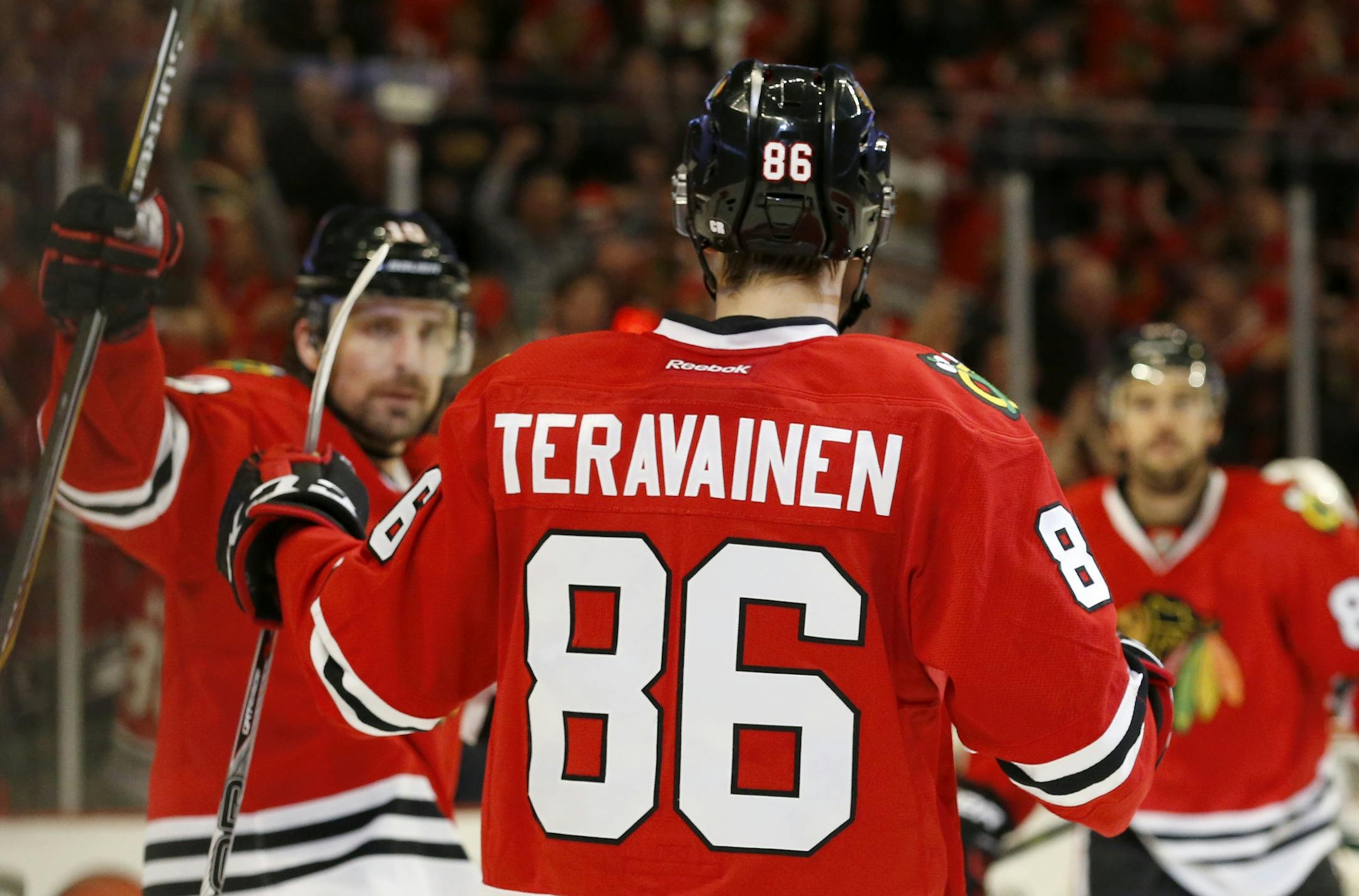Teuvo Teravainen (88) celebrated with teammates after scoring a goal in the second period.