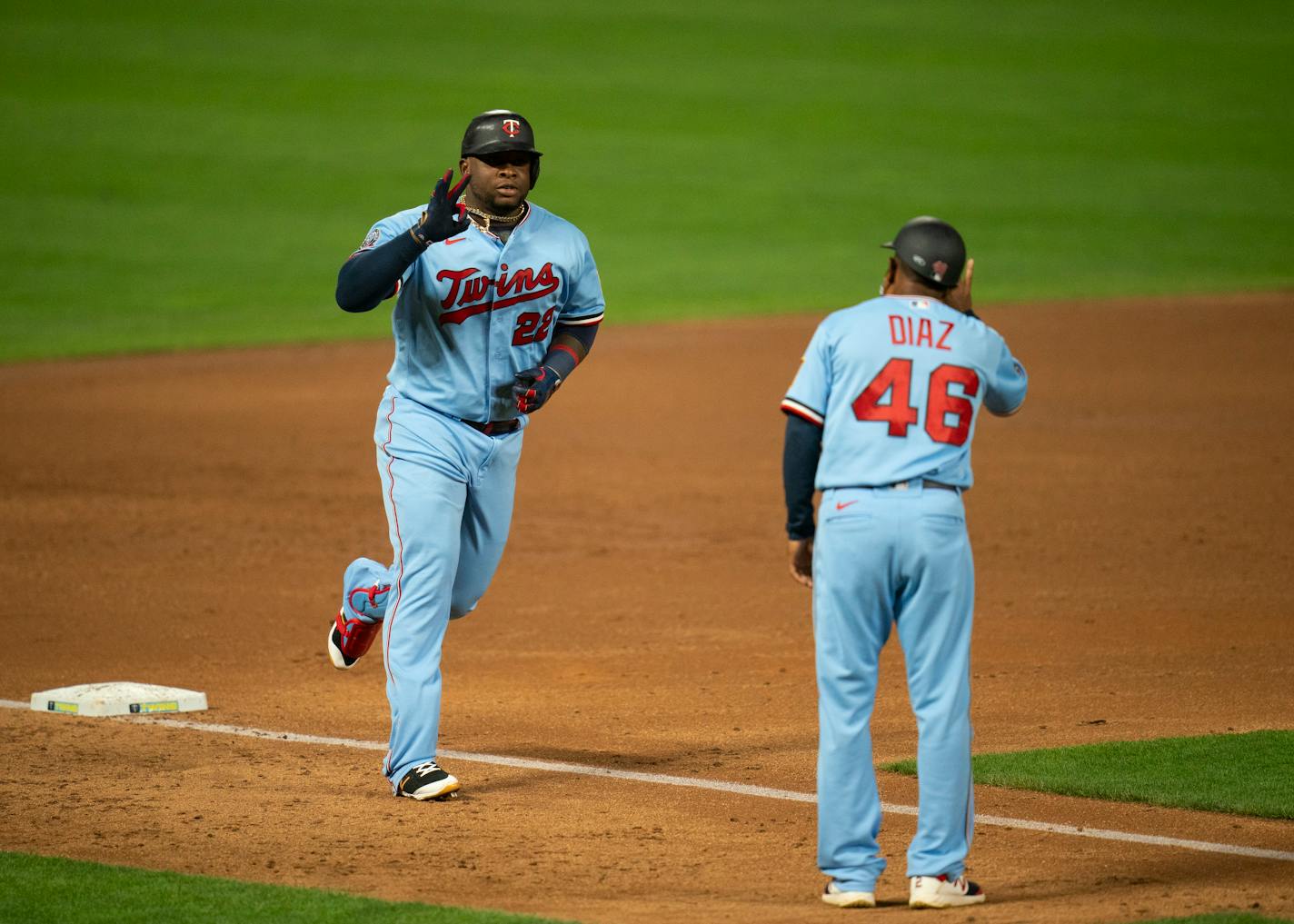 Twins first baseman Miguel Sano celebrated his third inning home run with third base coach Tony Diaz.