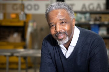 David Peeples, director of programs at The Food Group Minnesota, posed for a photo in the volunteer station in the warehouse on Wednesday, March 9, 20