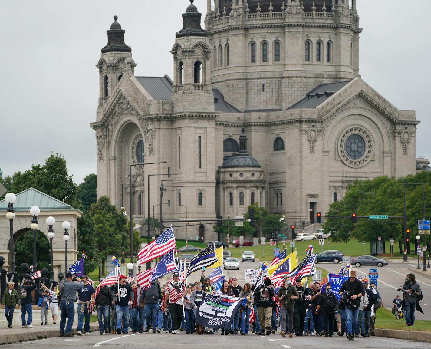 Several hundred people marched to the Minnesota State Capitol in St. Paul as part of the United We Stand & Patriots March for America on Saturday.