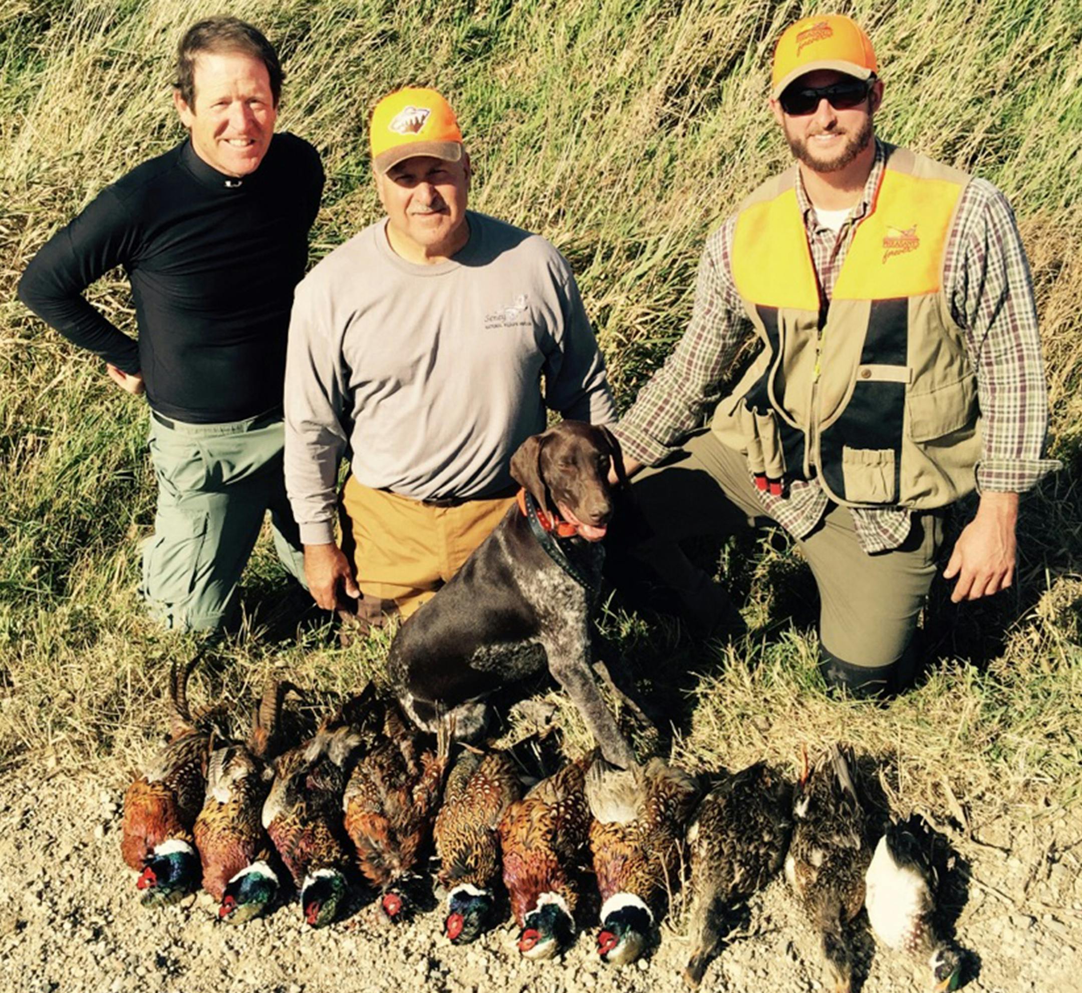 A life-long angler and hunter, Jim Leach, center, ended a day of pheasant and duck hunting last fall near Windom, Minn. He's flanked by son Brian (right) and a high school friend, Dr. Jim Finell (left). They hunted with others, including Brian's dog, Ruby.