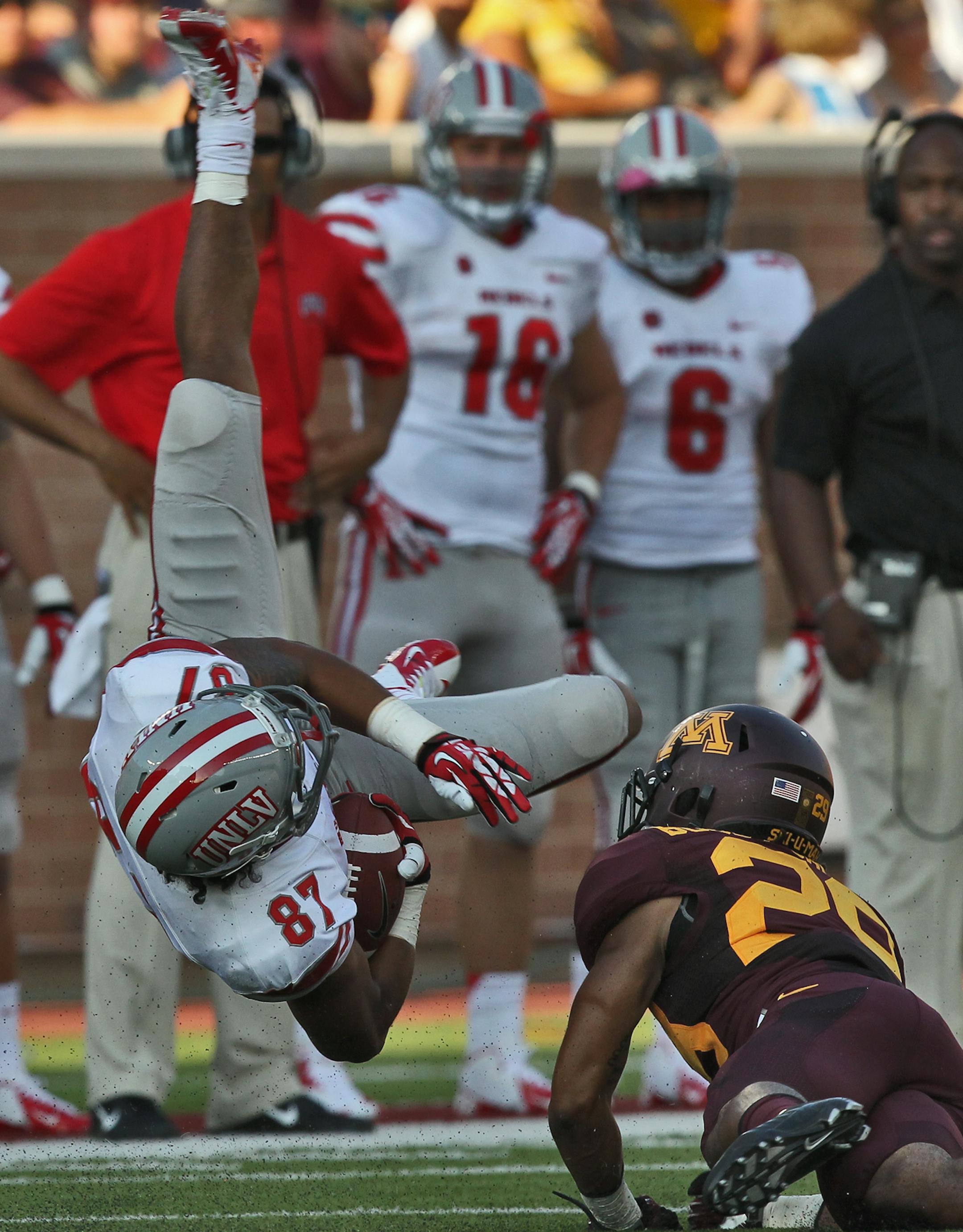 Gophers cornerback Briean Boddy-Calhoun sent UNLV receiver Maika Mataele flying after a reception.