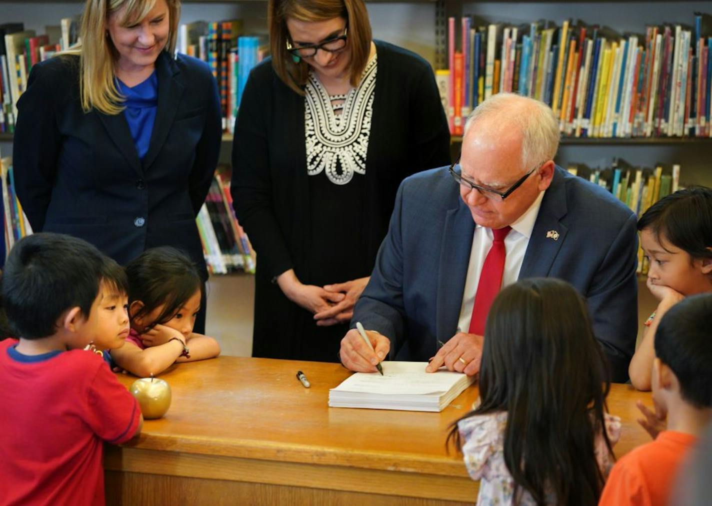 Under the watchful eye of Pre-K children from Bruce Vento Elementary School in St. Paul, Governor Tim Walz signed the school funding bill into law, and announced his intent to sign off on all the major budget bills completed during the special session. brian.peterson@startribune.com St. Paul, MN Thursday, May 30, 2019