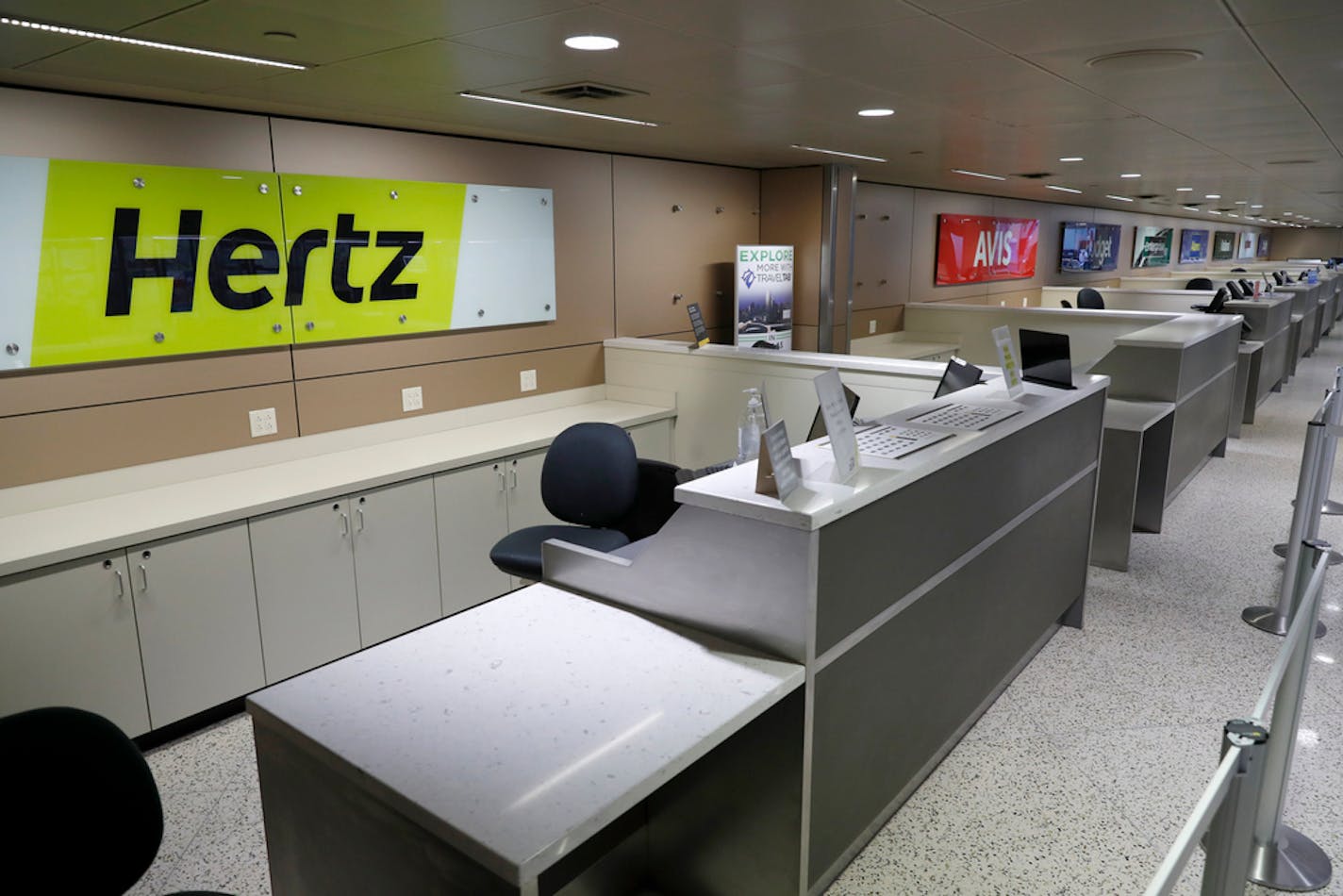 The car rental desk at Love Field sit unattended in the early afternoon in Dallas, Wednesday, June 24, 2020.