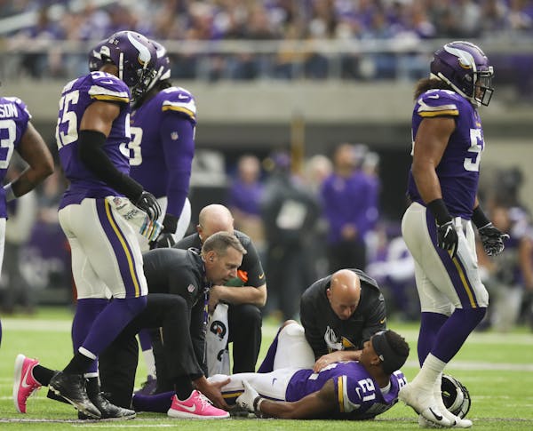 Minnesota Vikings cornerback Mike Hughes (21) was attended to after he reportedly tore his left ACL in the fourth quarter. ] JEFF WHEELER &#xef; jeff.