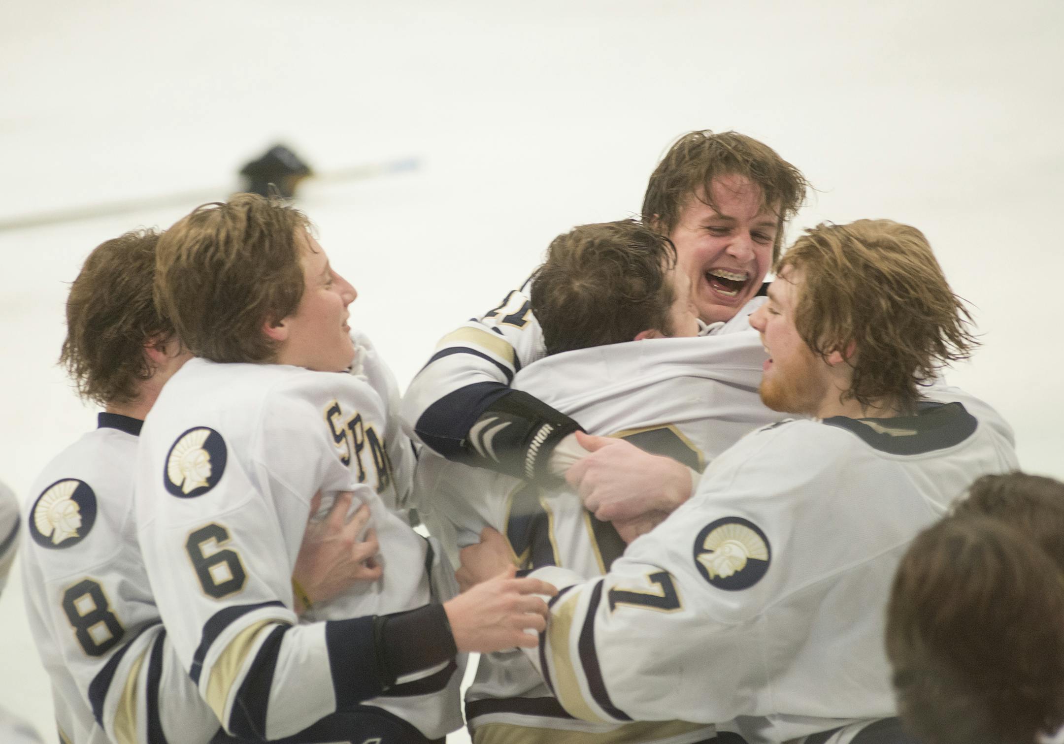 St. Paul Academy's (from left to right) Justin Jallen, Weston Lombard, Riley Bowman, Matt Dahlseide and Cullen McCabe celebrate after St. Paul Academy defeated Totino-Grace 7-1 in the Boys' Class 1A Section 4 State Hockey Final, Feb. 26, 2016, at the Roseville Ice Arena in Roseville, Minn. ] (Matthew Hintz, 022616, Roseville)