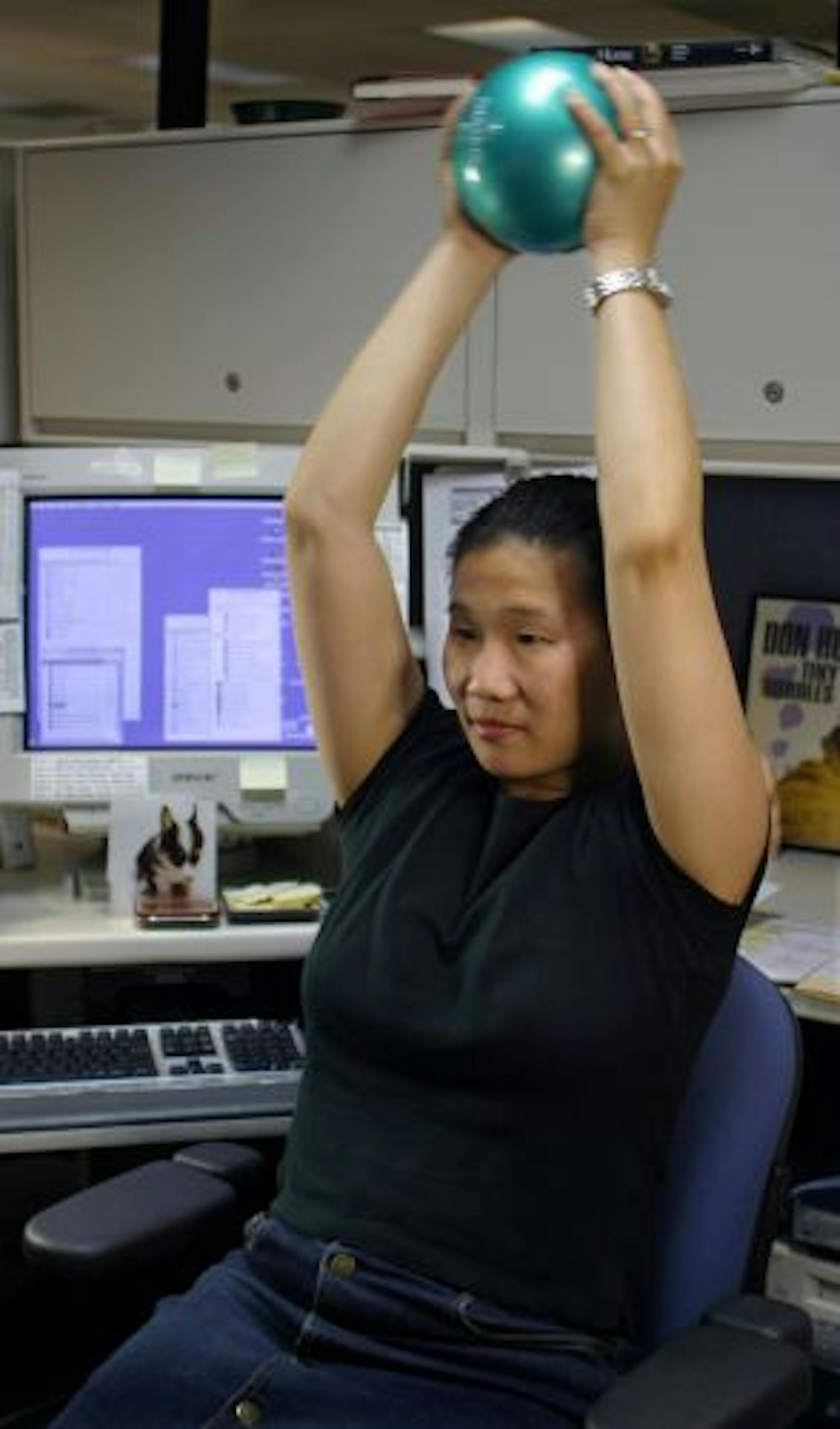 Danskin's vinyl-covered, weighted toning balls offer a mini-workout at your desk.