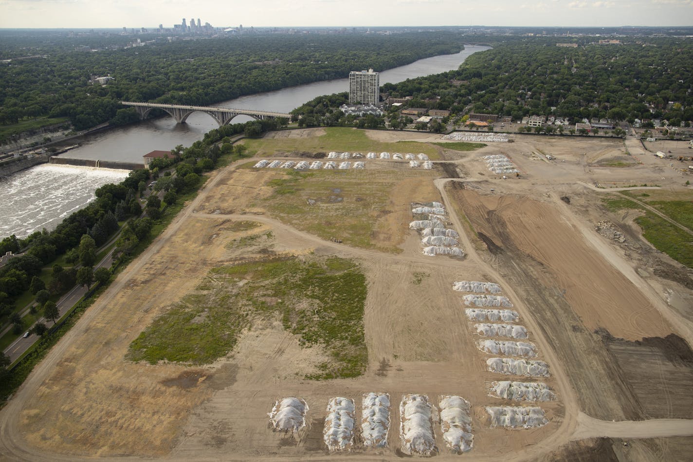 The former Ford assembly plant site, looking northwest, with the downtown Minneapolis in the background. ] JEFF WHEELER &#x2022; jeff.wheeler@startribune.com Minneapolis based Ryan Cos. US Inc. announced Monday that it will buy the site of the former Ford assembly plant, transforming the 122-acre parcel in the Highland Park neighborhood into a high-density urban village.The site near the Mississippi River was photographed from the air Monday evening, June 25, 2018.