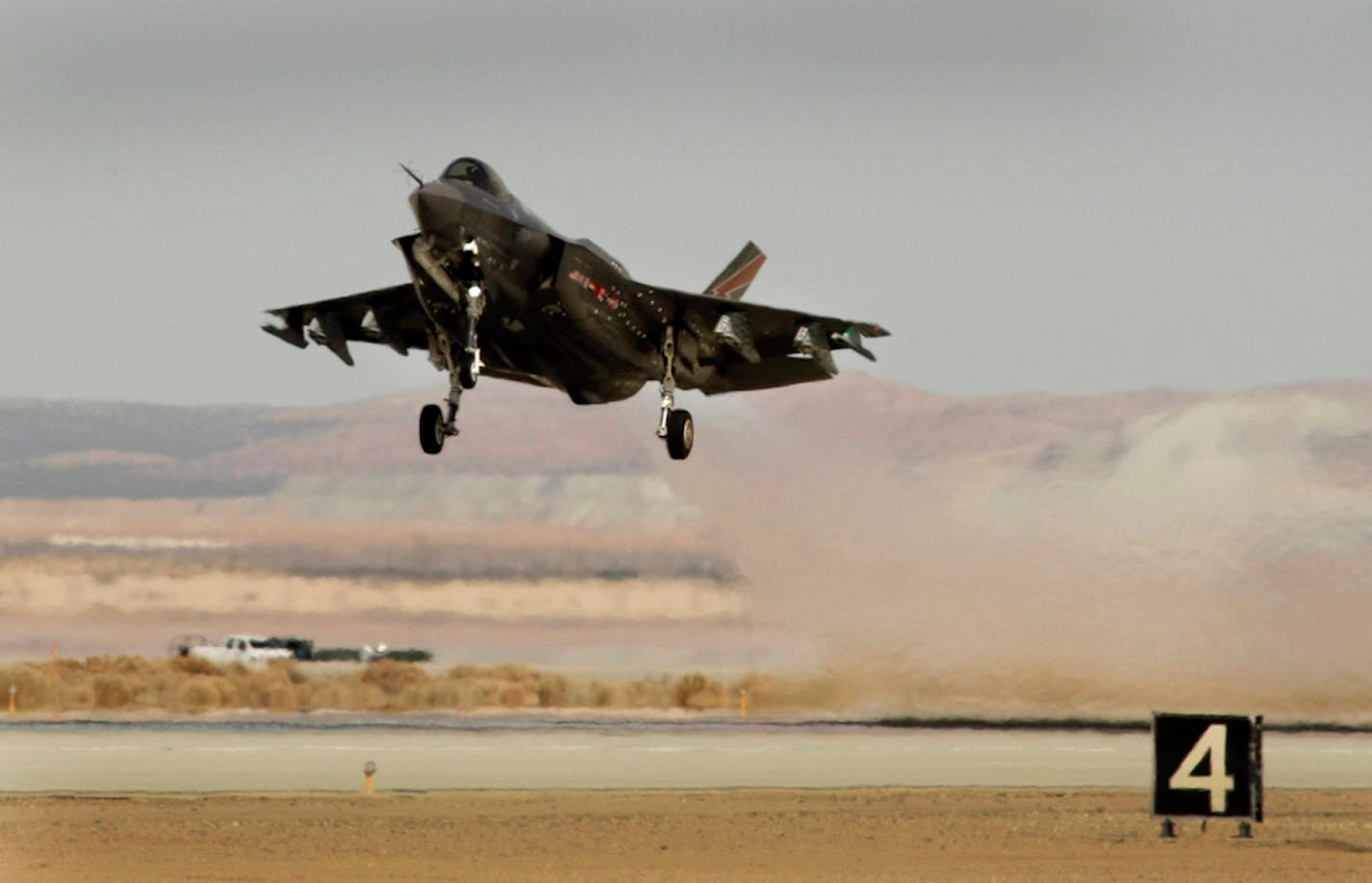 The Lockheed Martin F-35 Lightning II lifts off during testing at Edwards Air Force Base on March 19, 2013.