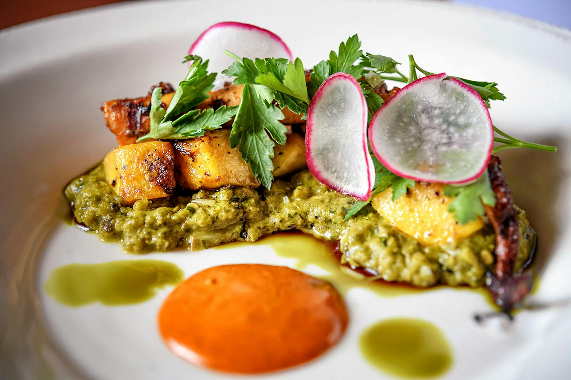 Pajarito, a new contemporary Mexican restaurant and bar in St. Paul co-owned by Tyge Nelson and Stephan Hesse. They are also co-chefs. food, Grilled Octopus.