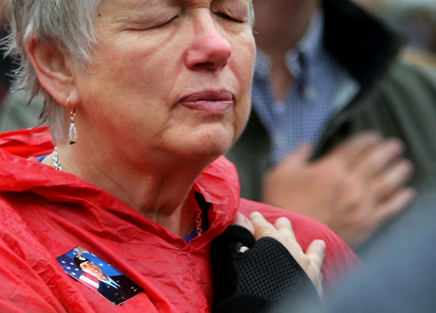 The Minnesota Military Family Tribute dedication ceremony was held Saturday, June 13, 2015, on the State Capitol Grounds in St. Paul, MN. Here, a tear fell as Jan Radde of Norwood listened to the singing of the National Anthem. Her son Air Force AIC Noah A. Radde, died in March of 2006 of medical complications. ](DAVID JOLES/STARTRIBUNE)djoles@startribune.com The Minnesota Military Family Tribute will be dedicated to Minnesota military families on the Minnesota State Capitol Grounds.**Jan Radde,