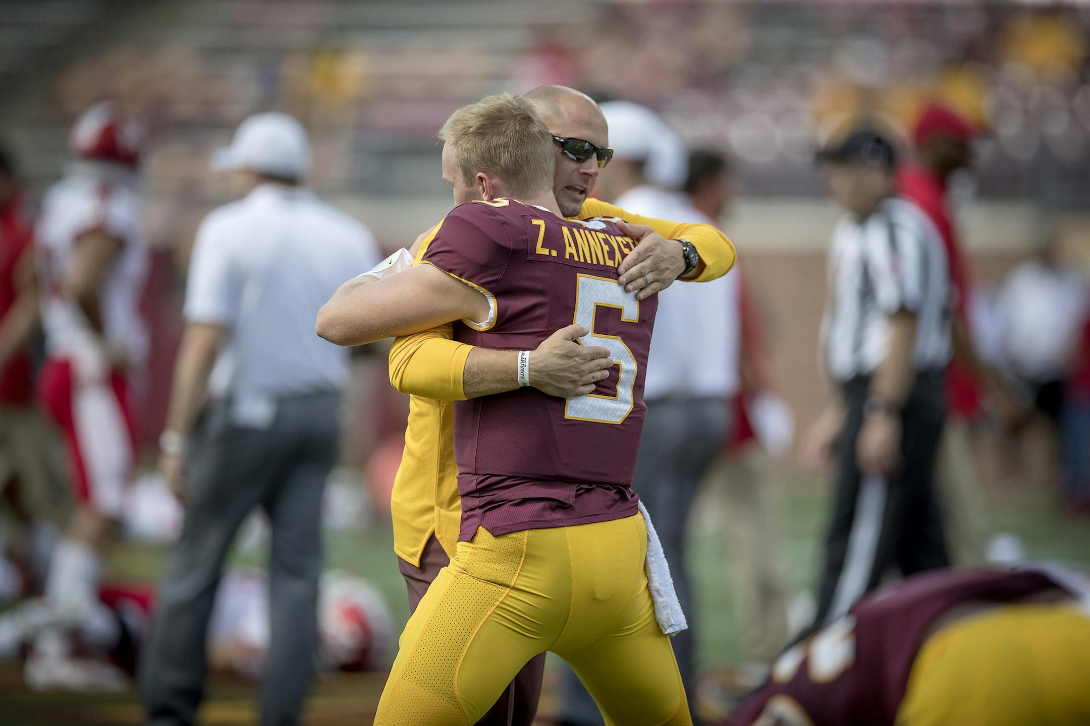 Minnesota's quarterback Zack Annexstad received a hug from P.J. Fleck as the team warmed up before Minnesota took on Miami (Ohio), Saturday, September 15, 2018 in Minneapolis, MN. ] ELIZABETH FLORES ï liz.flores@startribune.com