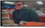 Surveillance image from credit union robbery Wednesday.