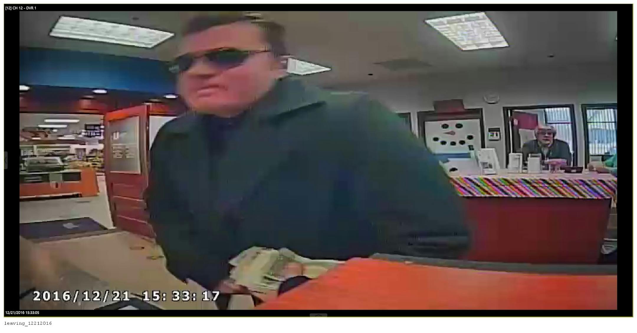 Surveillance image from credit union robbery Wednesday.