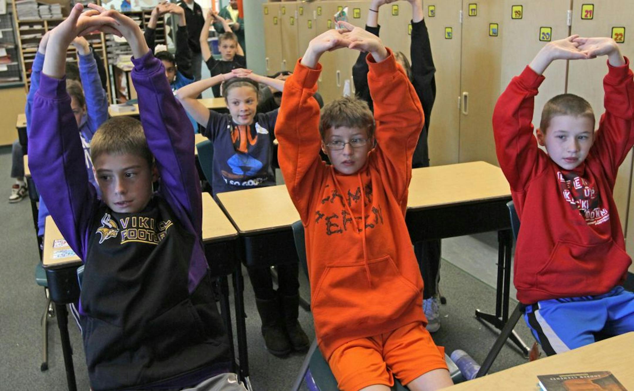 Meadowview Elementary School 5th grade students took part in a one minute warm-up before the start of class as part of a program designed by P.E. instructor Joe McCarthy. The Farmington MN. elementary school has started to incorporate physical activity in several different ways during the school day, including one minute warm-ups in the class and a lunch time running club that rewards students for physical activity.