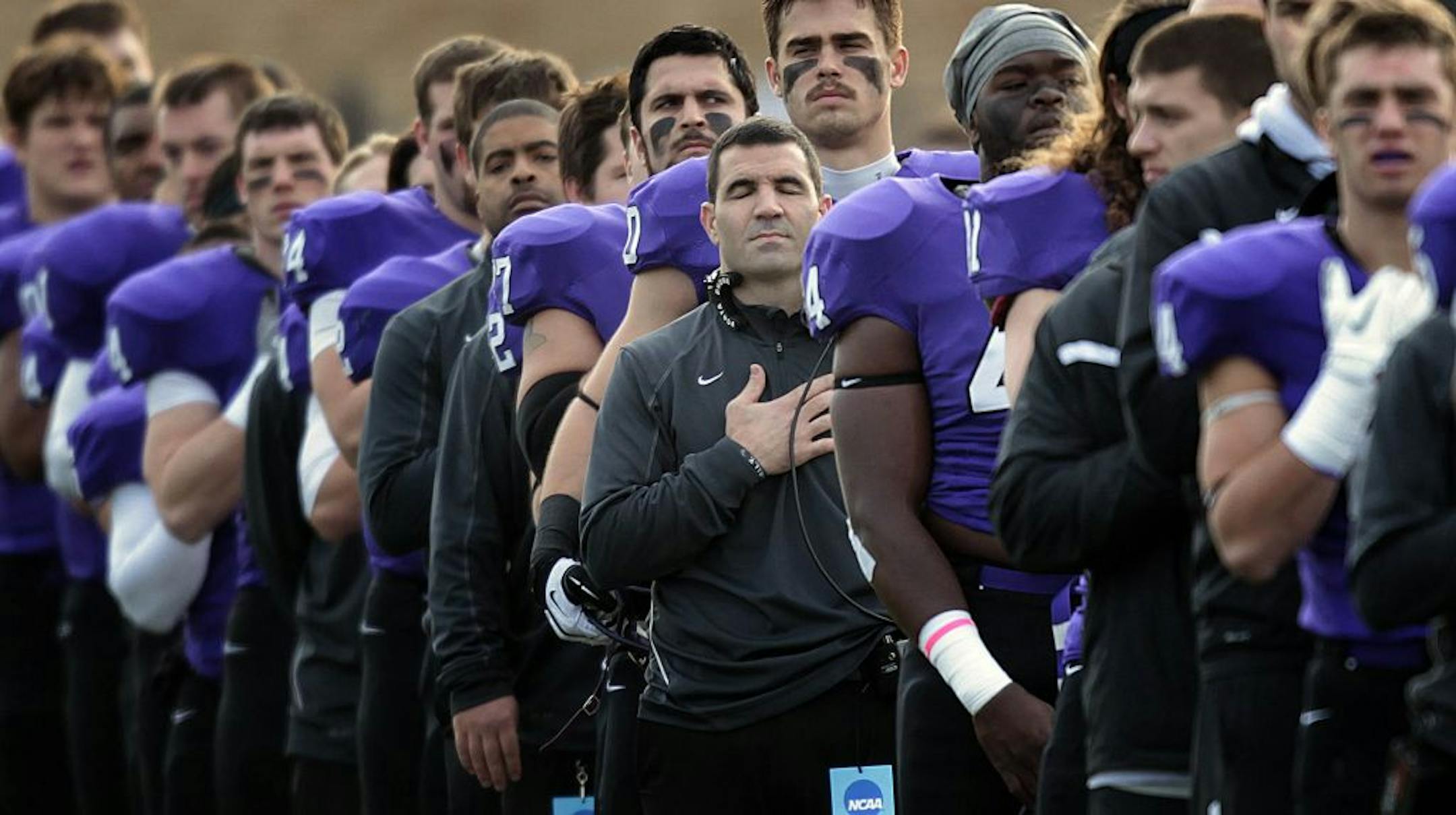St. Thomas coach Glenn Caruso (center) has taken his team to the brink of an undefeated season and the school's first national football championship. The Tommies will be on foreign soil tonight, though. After winning their first four playoff games in St. Paul, they will play in Salem, Va., a site their opponent is plenty familiar with.
