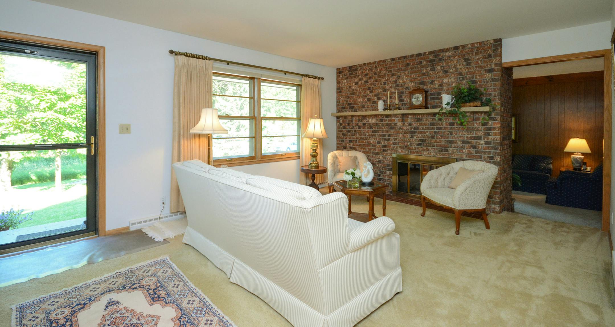 BEFORE: Living room in the Adams family's Excelsior duplex.