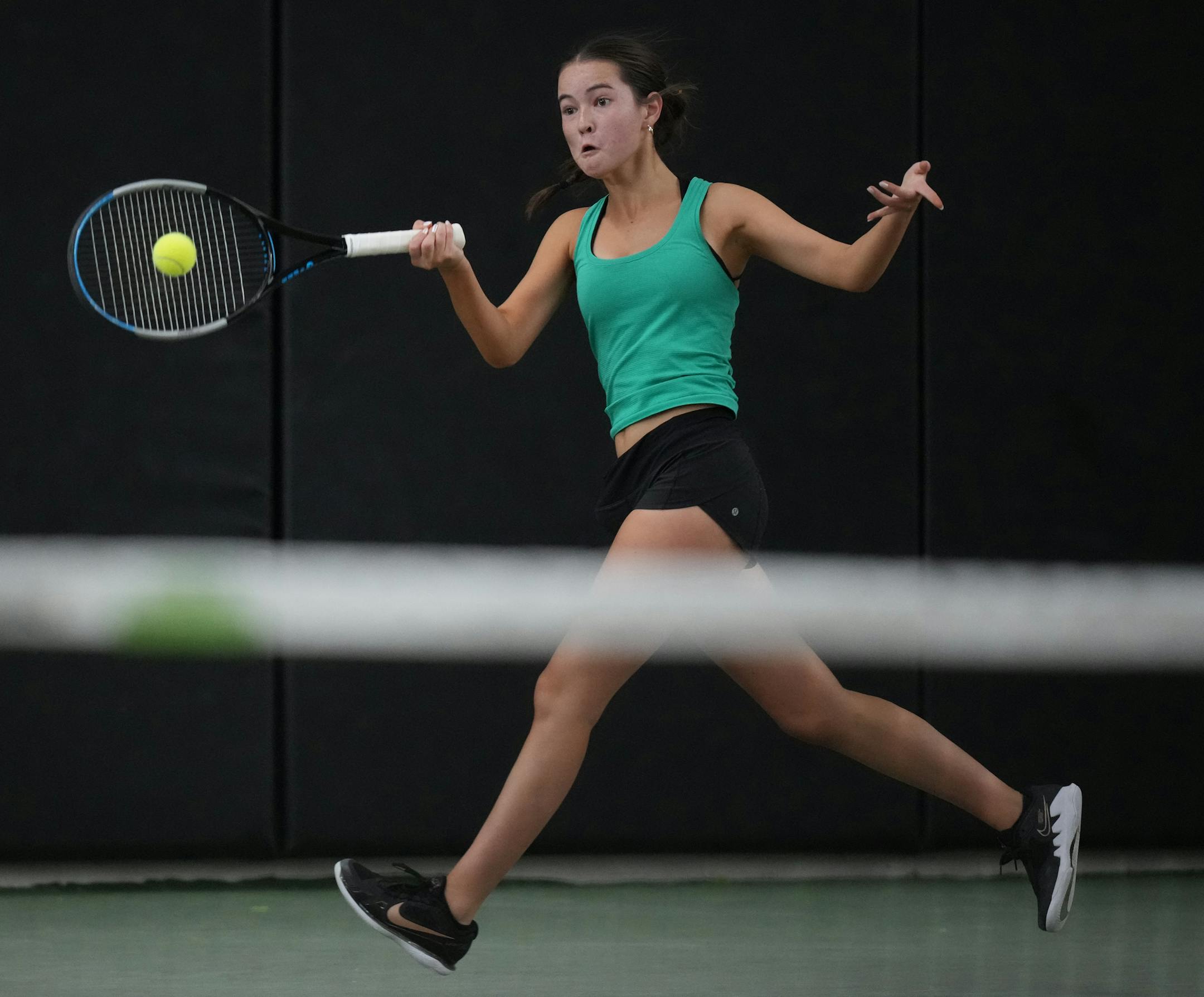 Aoife Loftus of Mayo returns a volley on the way to beating Astrid Kerrman of Edina at the Baseline Tennis Center in Minneapolis, Minnesota on Wednesday, Oct. 25, 2023.