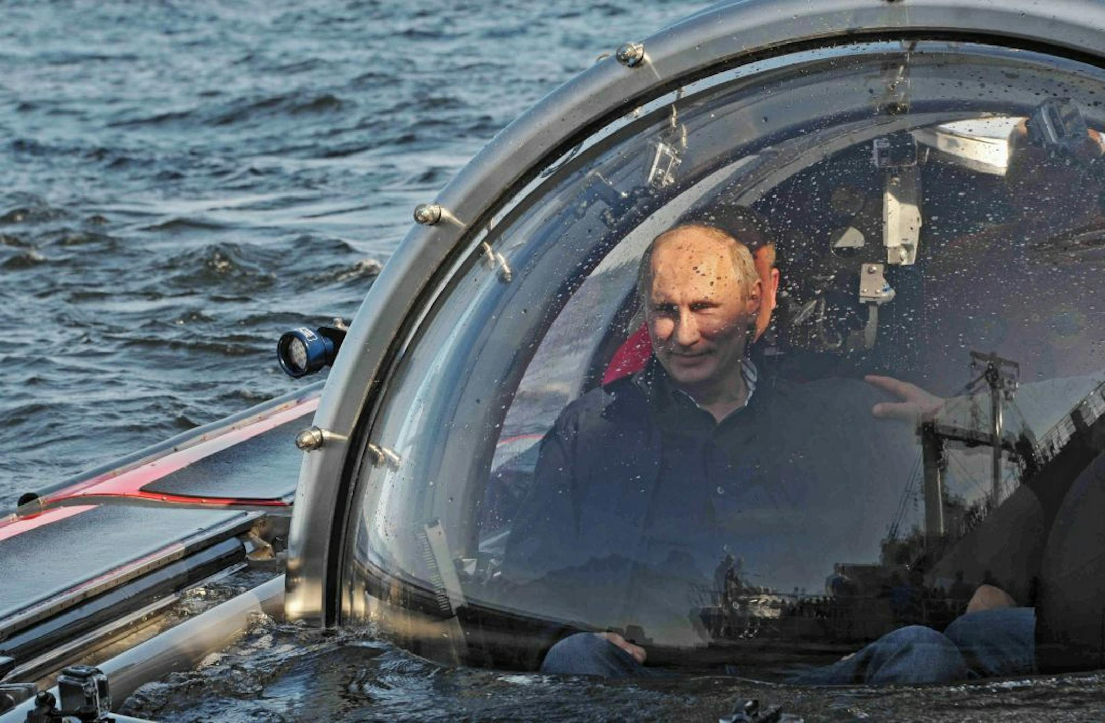 Russian President Vladimir Putin submerges on board Sea Explorer 5 bathyscaphe off the island of Gogland 180 kilometers (110 miles) west of St. Petersburg, Russia, Monday, July 15, 2013.