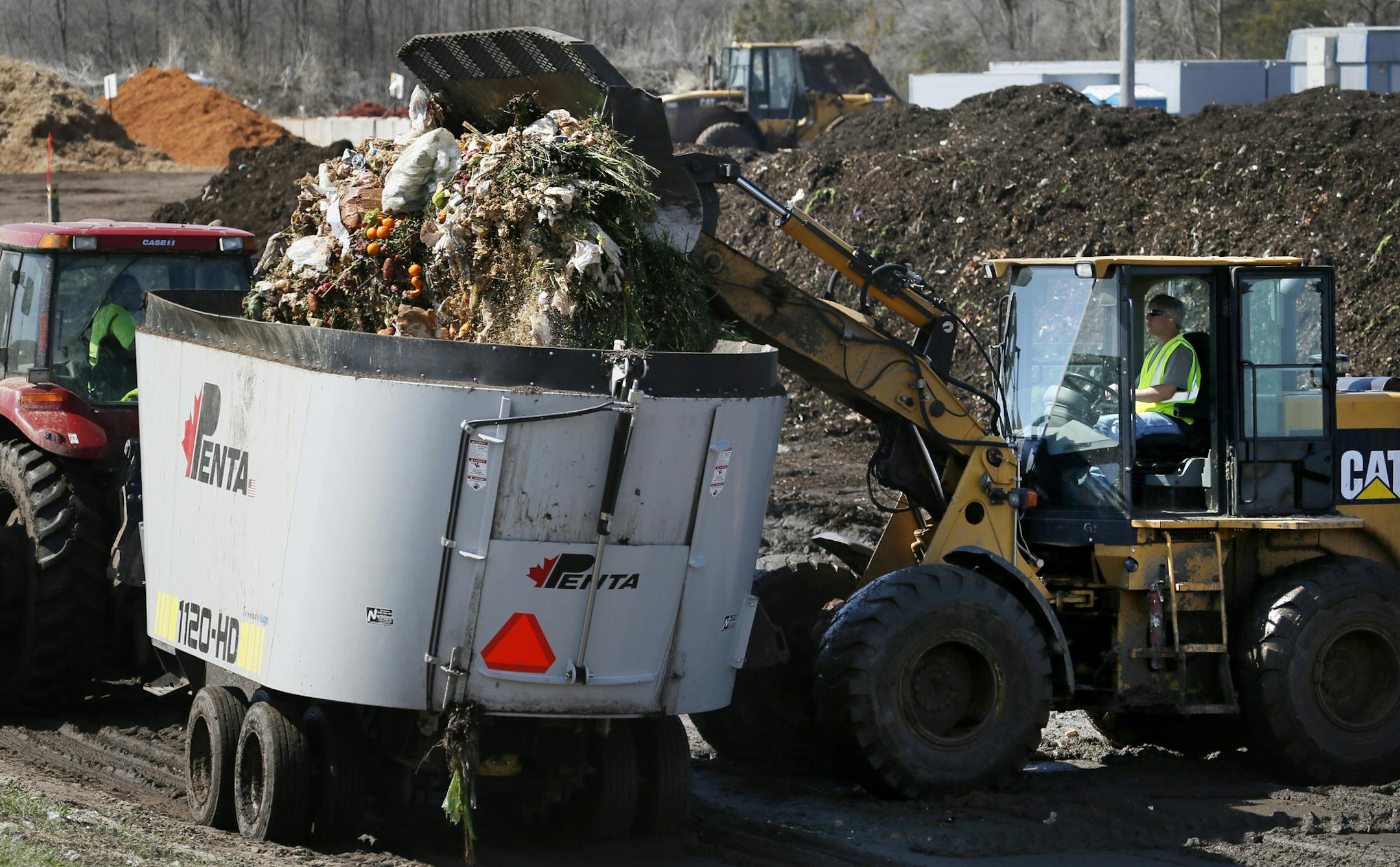 A decade after Hennepin County began pilot programs to build organics recyling among residents, just 11 cities in the county offer those programs. The number is expected to reach an even dozen next week, when the St. Louis Park City Council votes on a plan to start organics recycling this fall. Here, food waste is added to a hopper for mixing with yard waste at Organics Recycling Development in Rosemount.] BRIAN PETERSON ‚Ä¢ brianp@startribune.com Rosemount, MN - 05/07/2013