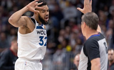 Wolves center Karl-Anthony Towns reacts after making a three-pointer in the second quarter against the Denver Nuggets on Monday night. He had 27 point
