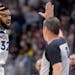 Wolves center Karl-Anthony Towns reacts after making a three-pointer in the second quarter against the Denver Nuggets on Monday night. He had 27 point