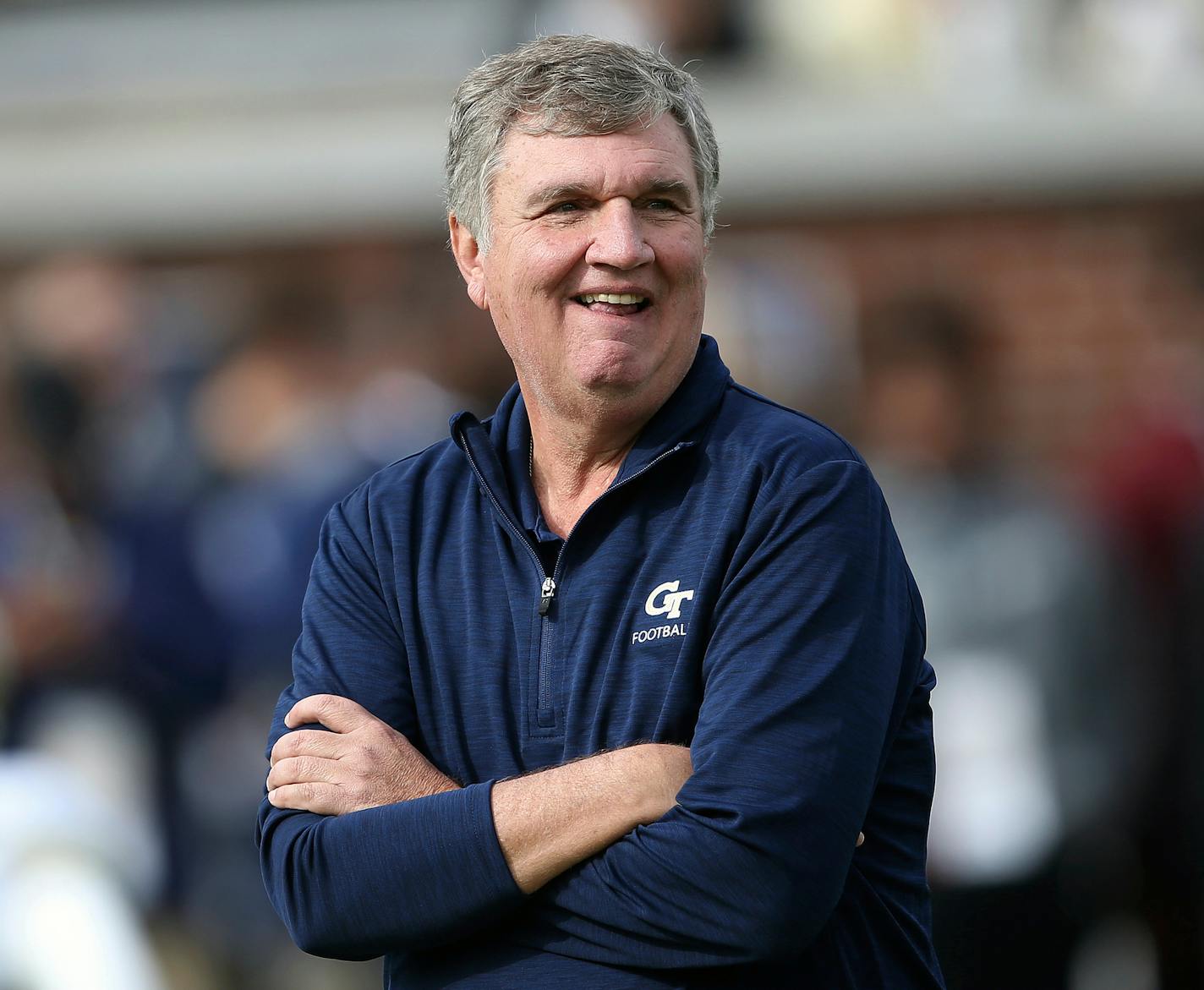 FILE - In this Nov. 25, 2017, file photo, Georgia Tech head coach Paul Johnson watches teams warm up before the first half of an NCAA college football game between Georgia Tech and Georgia, in Atlanta. Georgia Tech's underclassmen will want to make a good first impression on Geoff Collins, who has been announced as the successor to outgoing coach Paul Johnson. But with Johnson staying with the Yellow Jackets for their Quick Lane Bowl game against Minnesota, players say their first priority is gi